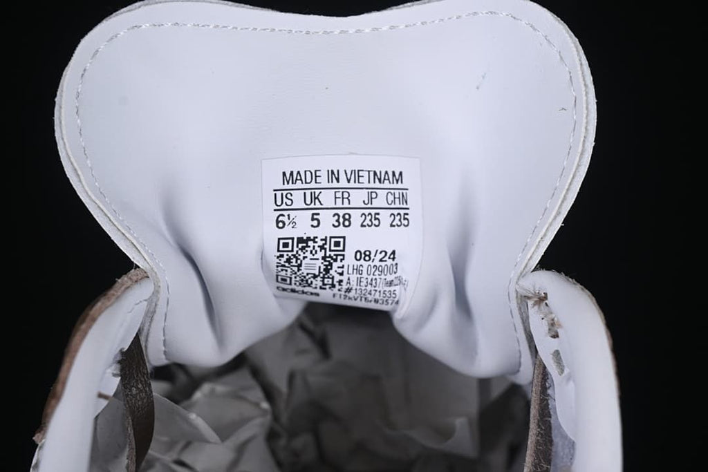 Close-up of the shoe size label showing EU 38 and other sizing details.