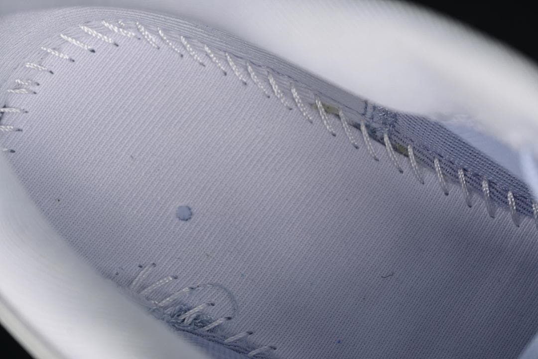 Close-up of the shoe's interior stitching and lining.