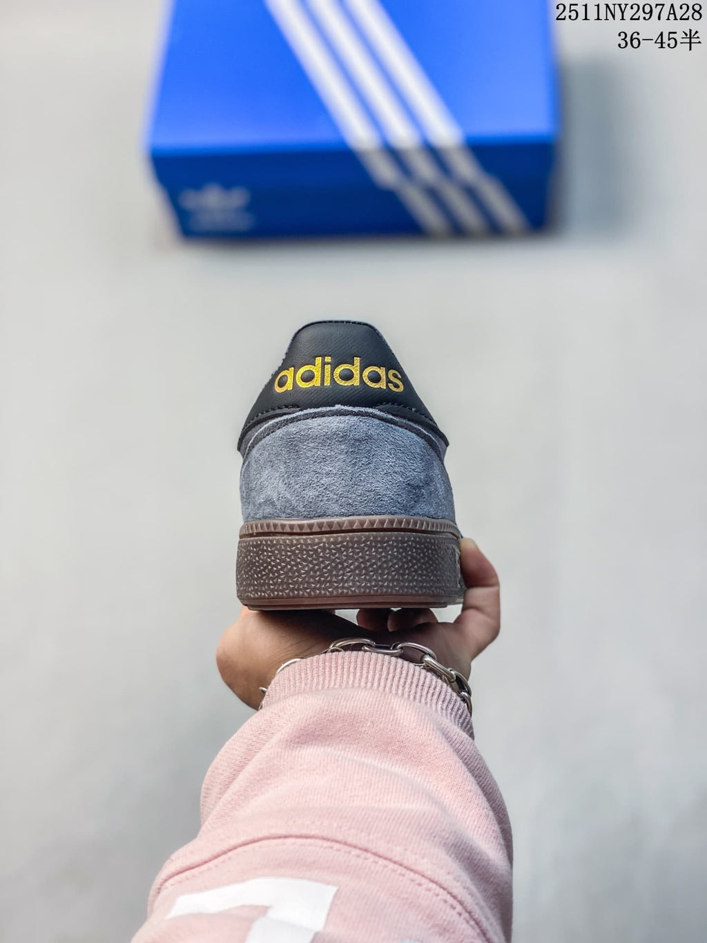 Rear view showing the gray heel and brown outsole