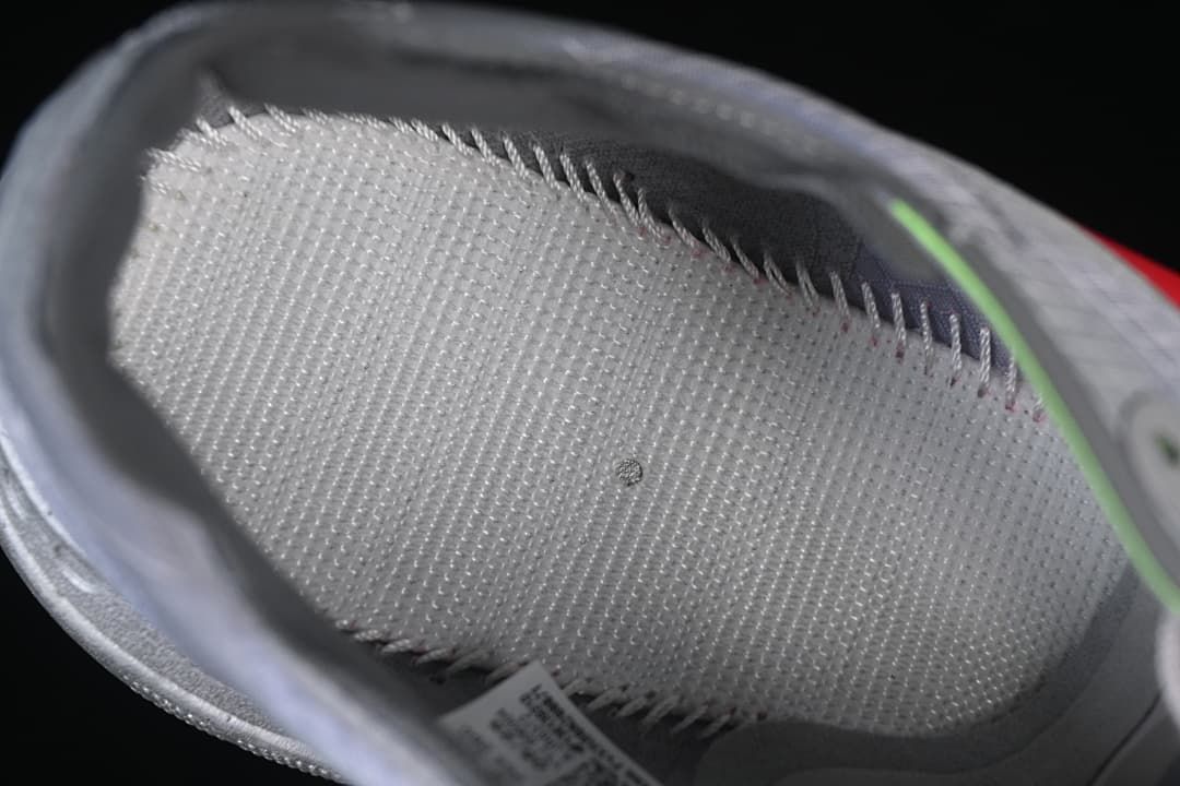 Close-up inside the shoe showing the footbed and lining