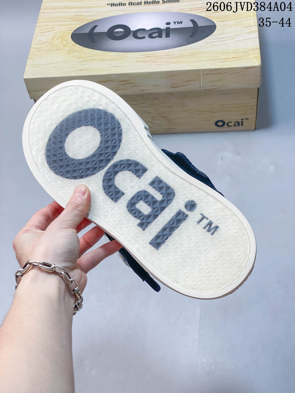 Underside of an Ocai sneaker showing a textured white outsole