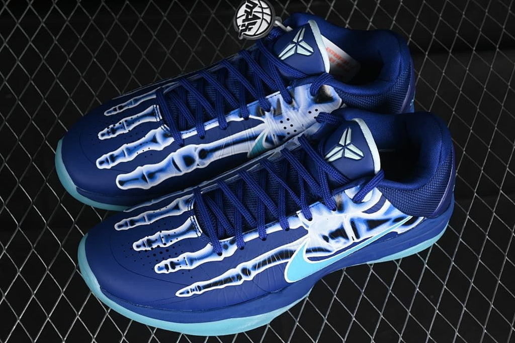 Pair of blue and aqua Kobe 5 Protro basketball shoes