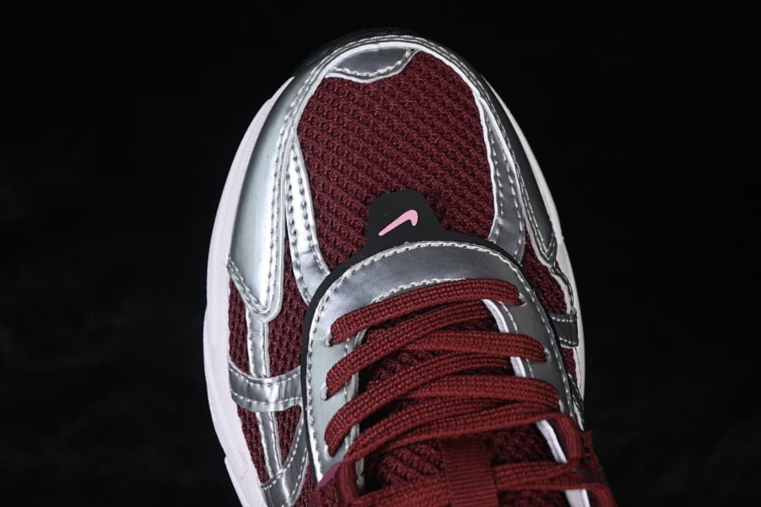 Top-front close-up of the mesh toe and metallic silver overlays