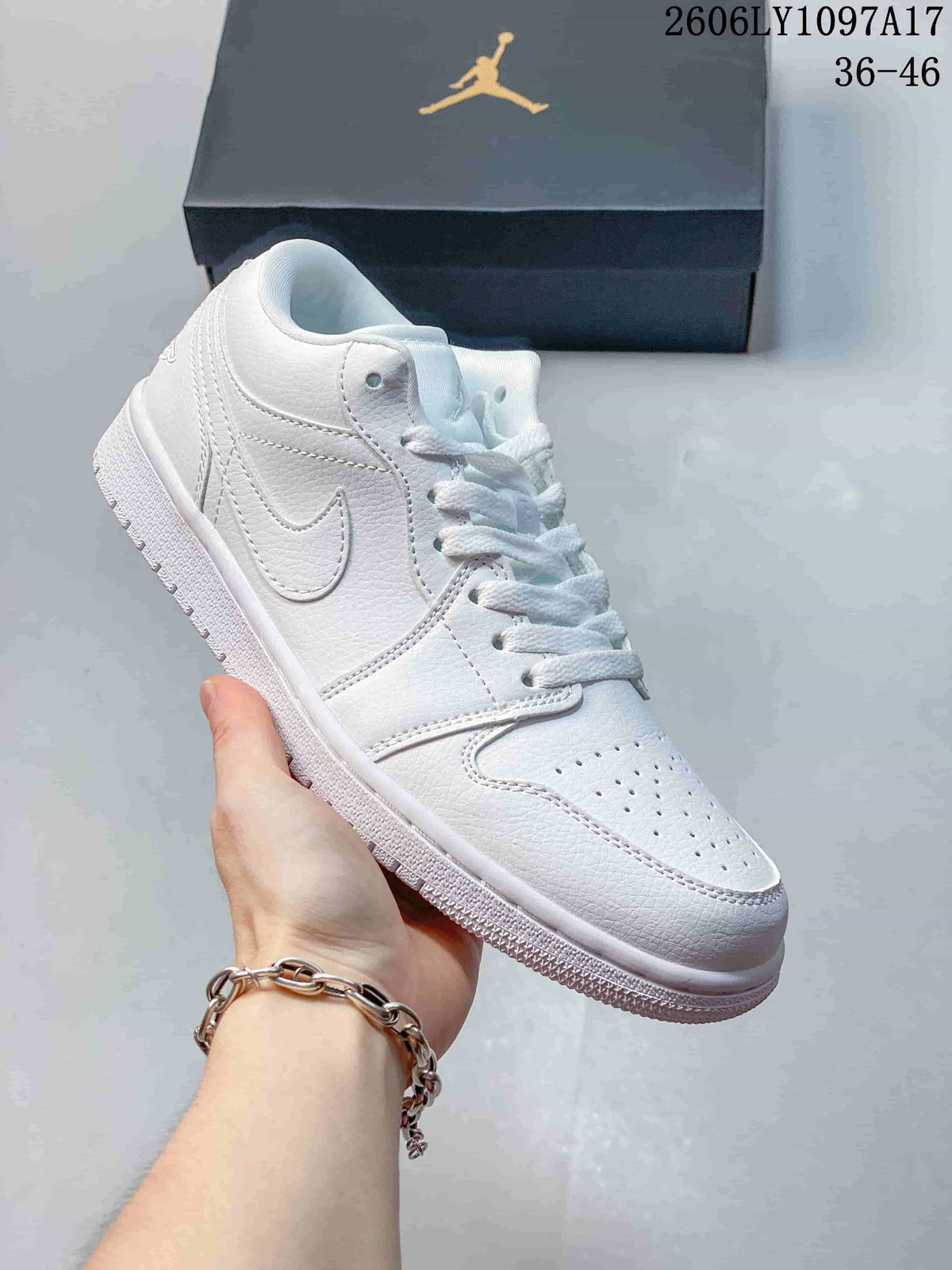 Angled side view of a white low-top sneaker with a Swoosh detail