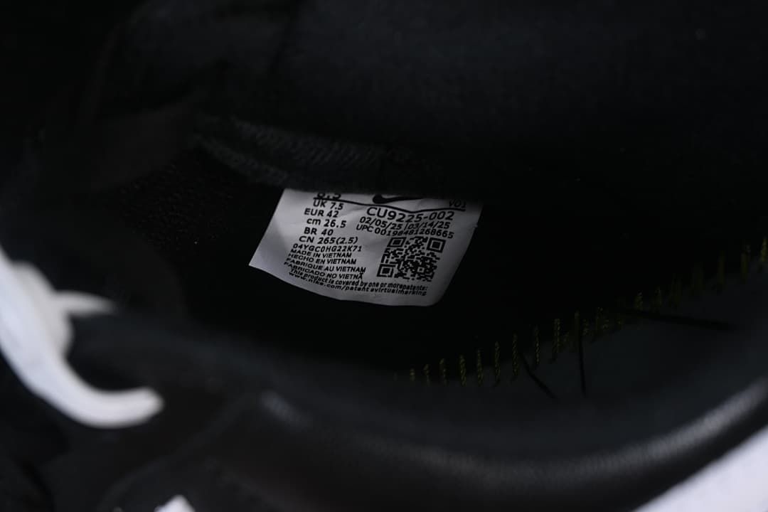 Interior shoe size label showing EU 42 and style code CU9225-002