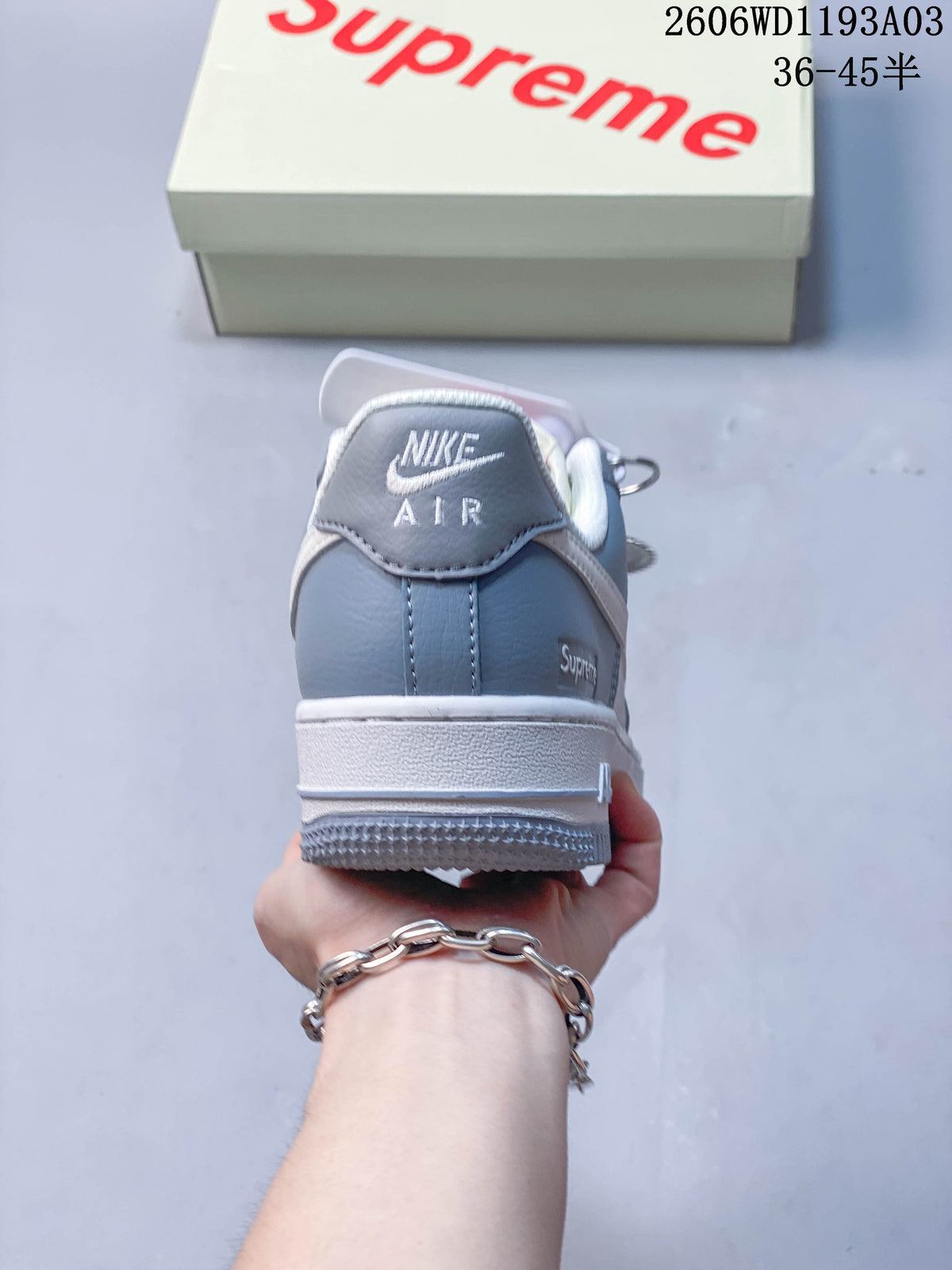 Rear view of the sneakers with grey heel panels
