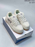Pair of ivory MLB Chunky Classic monogram sneakers on a shoe box