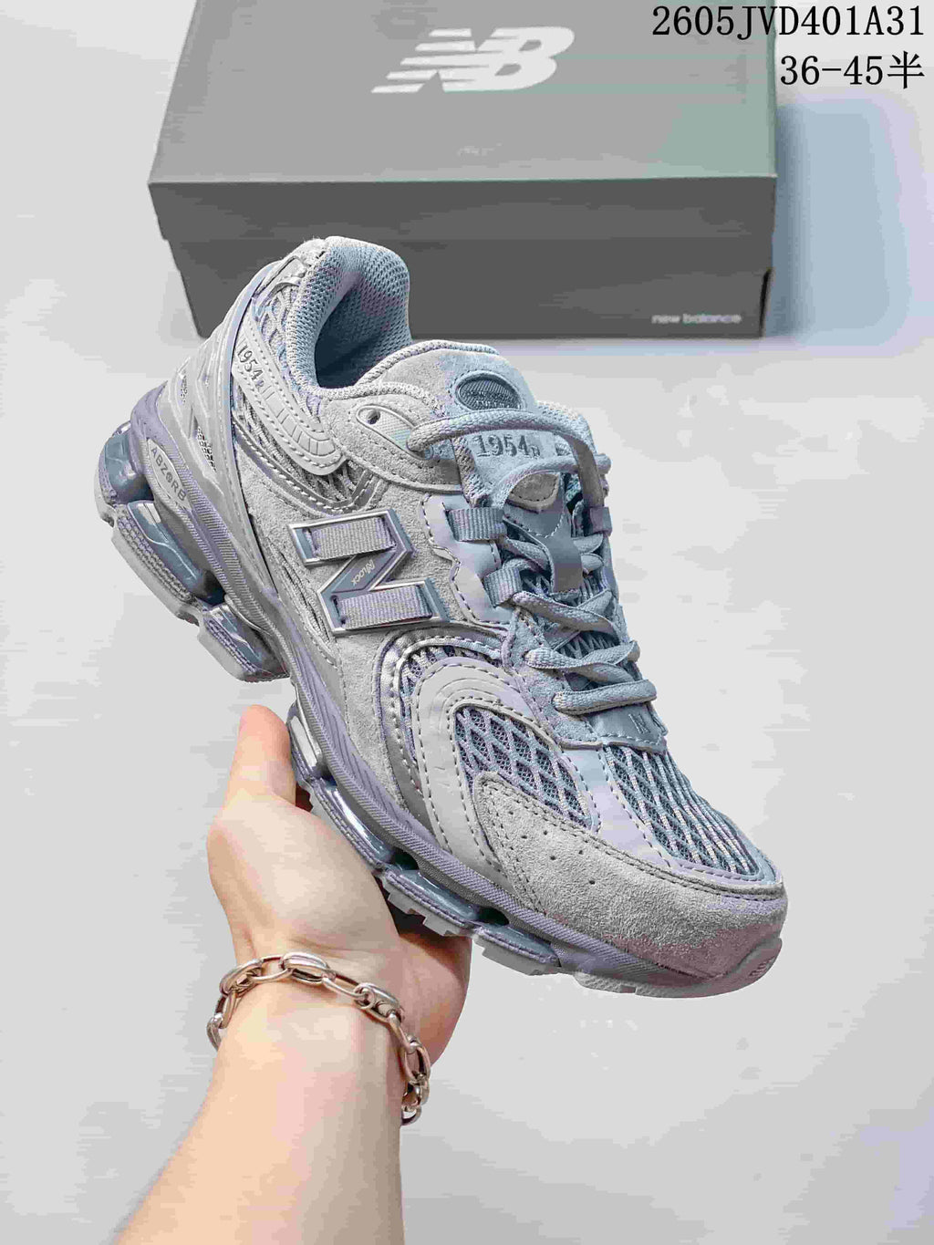 Angled side view of the sneaker showing its layered upper and outsole.
