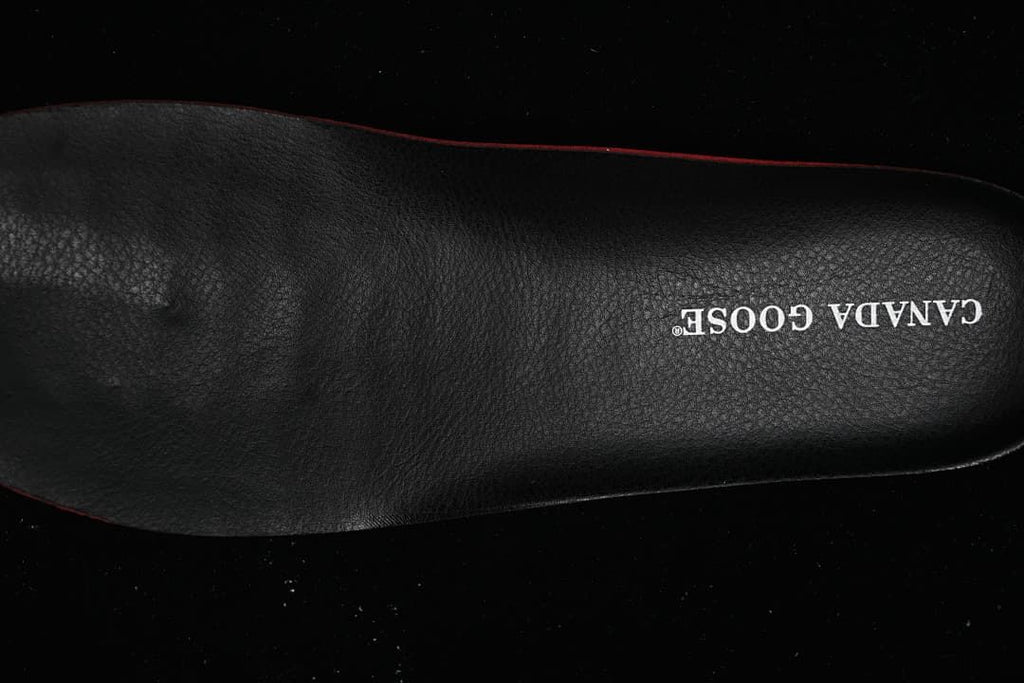 Close-up of the black insole with Canada Goose lettering