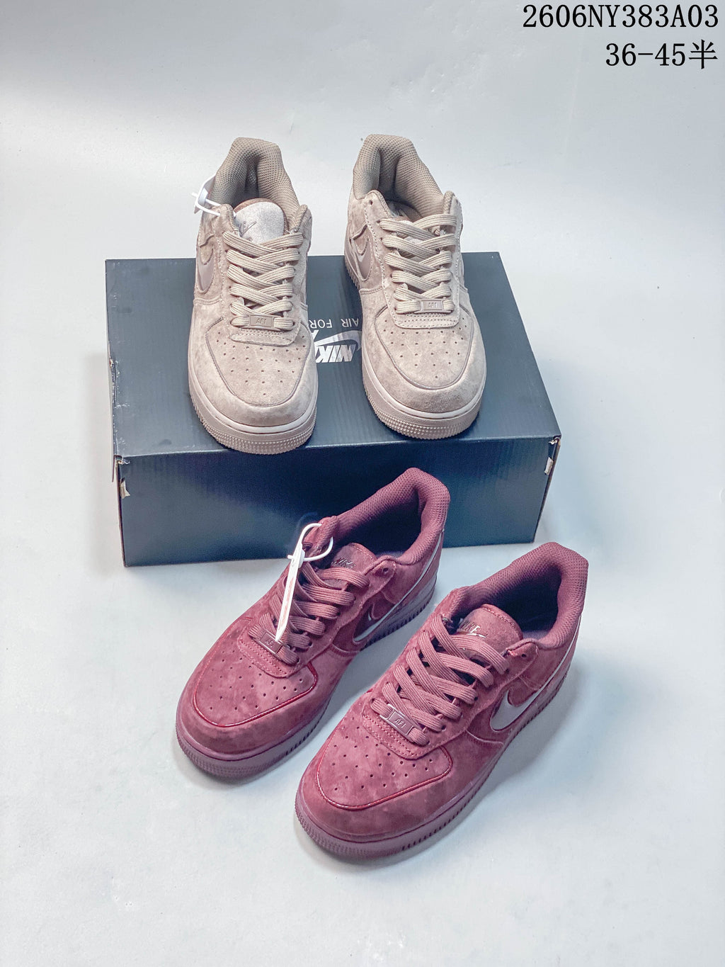 Beige and deep rose pairs of Nike Air Force 1 low-top sneakers