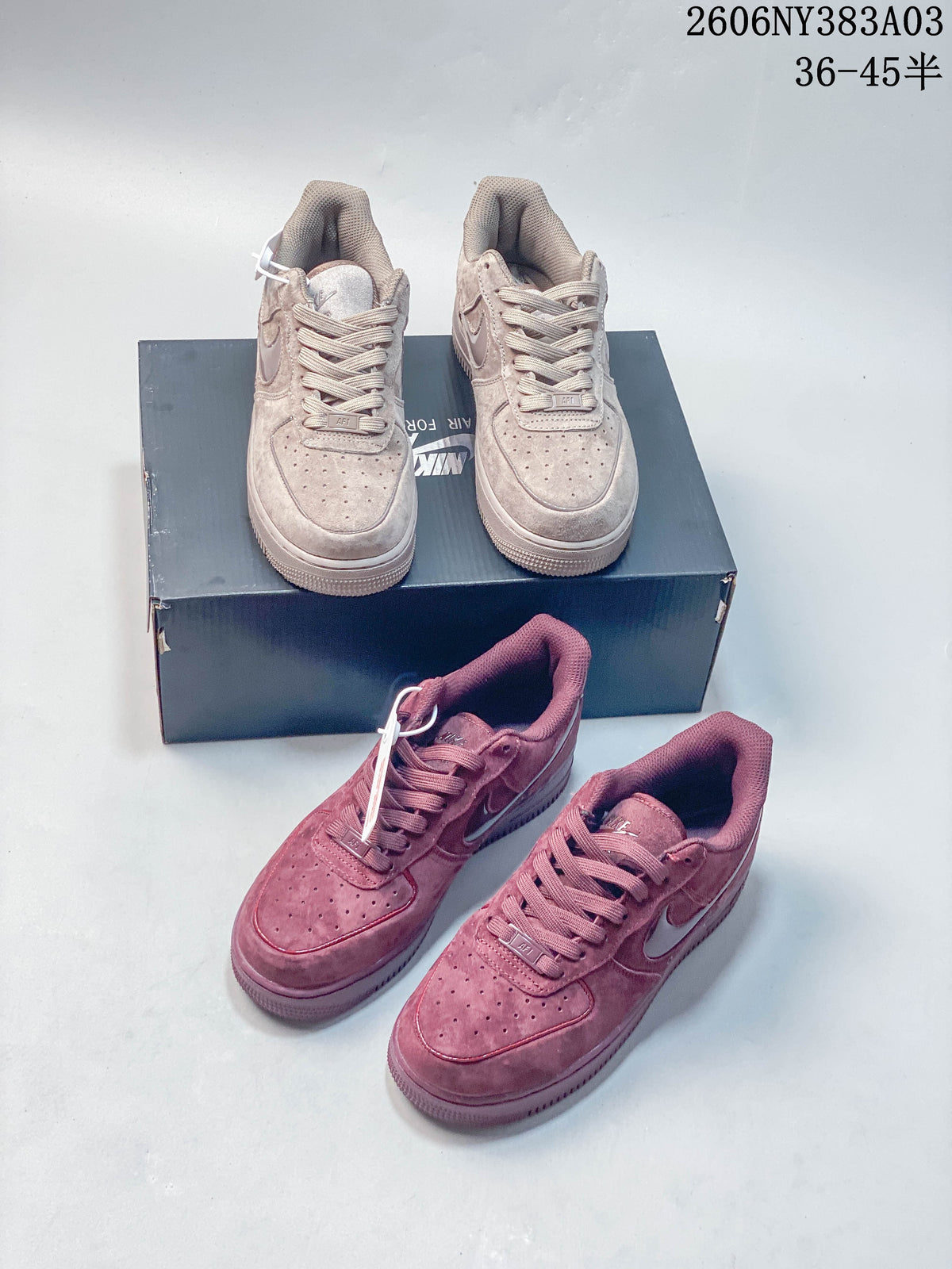 Beige and deep rose pairs of Nike Air Force 1 low-top sneakers