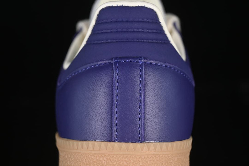Rear view showing the purple heel and gum outsole