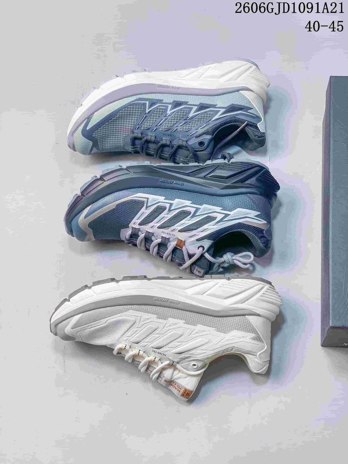 Three KAILAS trail shoes shown from above and side, in blue-gray and white colorways.