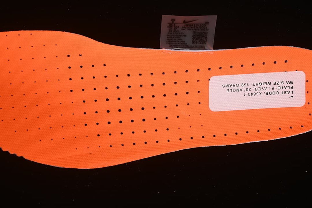Close-up of the orange perforated shoe insert