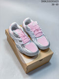 Pink and silver ASICS Gel-Pickax sneakers displayed on a shoebox.