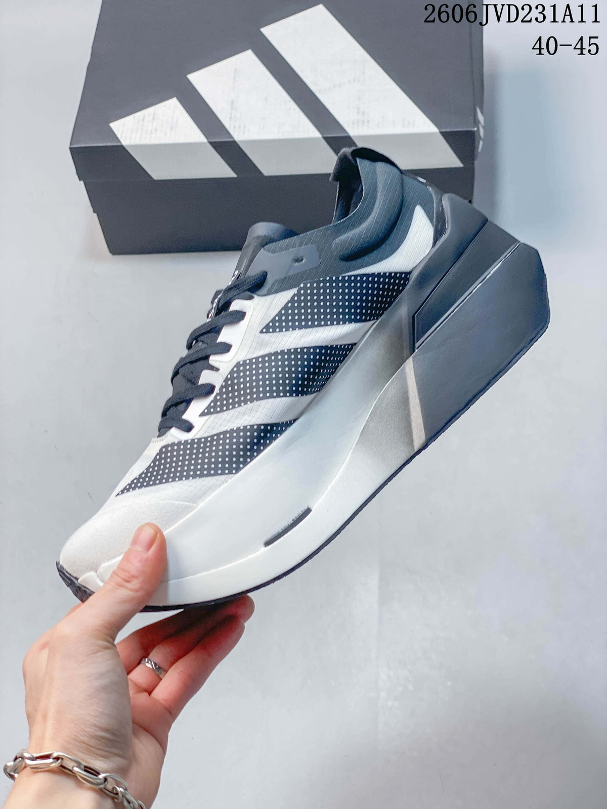 Side profile of a white and gray Adidas Adizero Dropset Elite running shoe