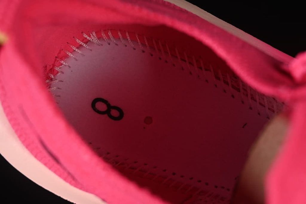 Close-up view inside the pink running shoe