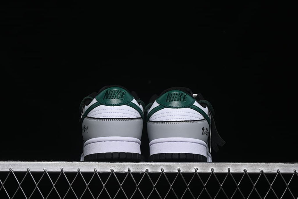 Rear view of the pair showing green heel tabs and gray panels