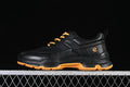 Side view of a black ECCO BIOM sneaker with amber laces and outsole accents