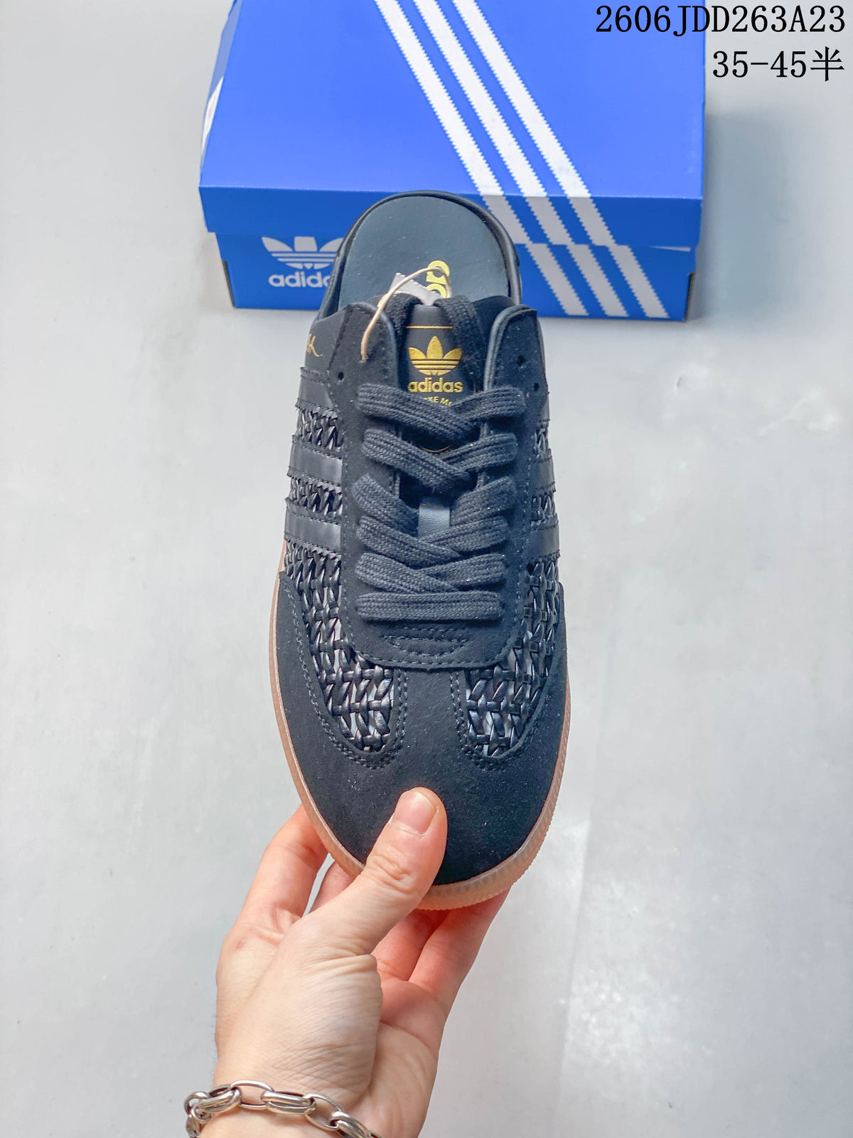 Top view showing the lace-up front and woven-look panels