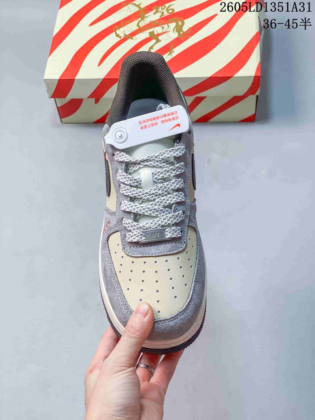 Top view showing the perforated toe, patterned laces, and gray overlays