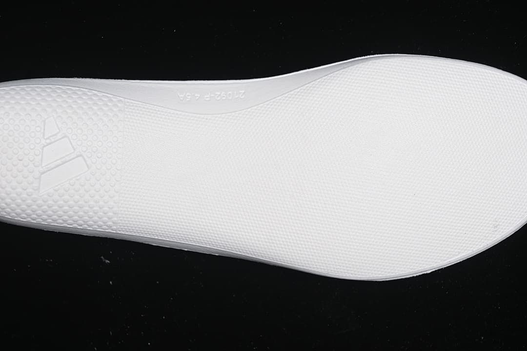 Close-up of the white outsole with adidas branding.