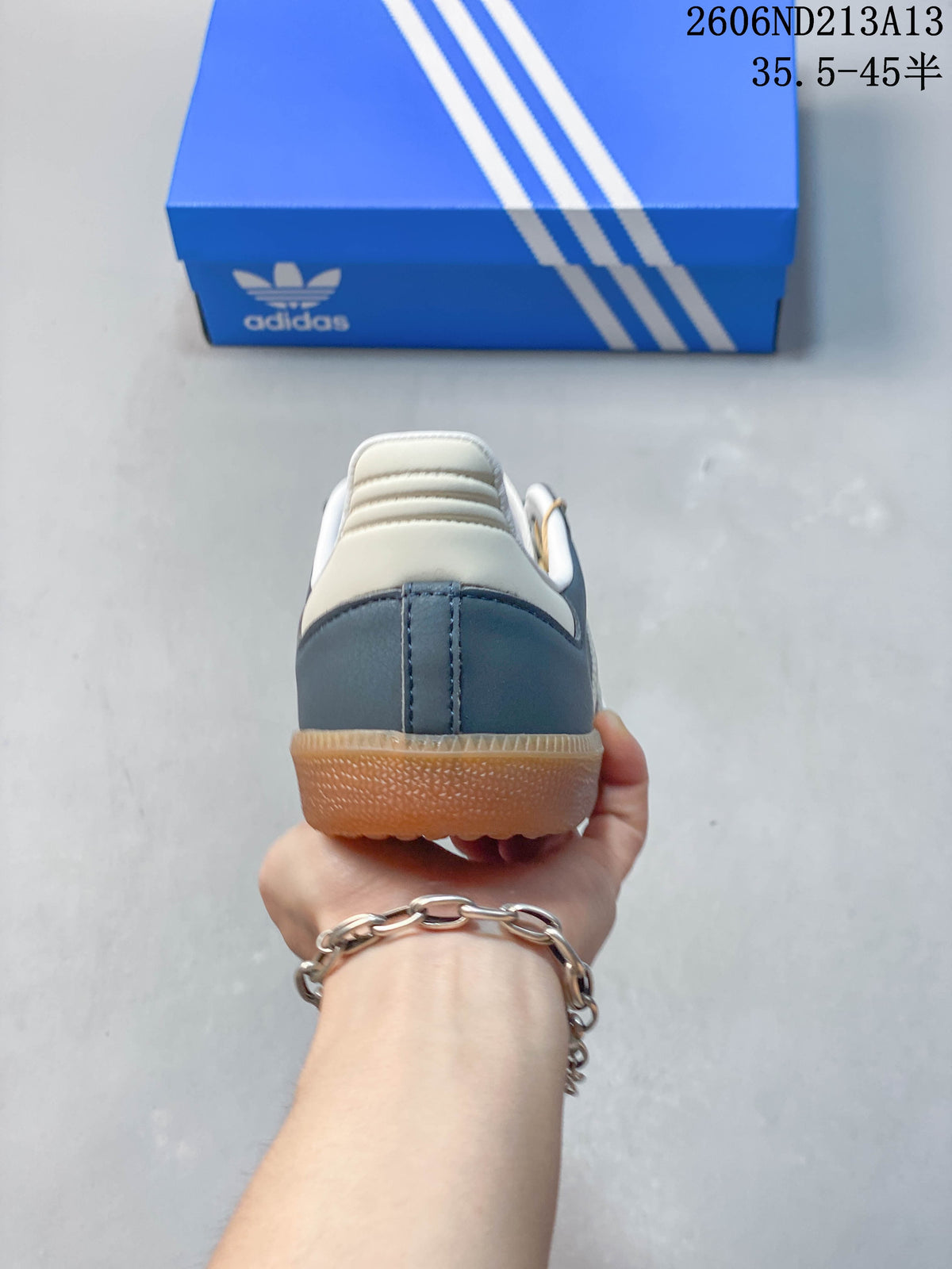 Rear view of the blue and cream adidas Samba OG sneaker