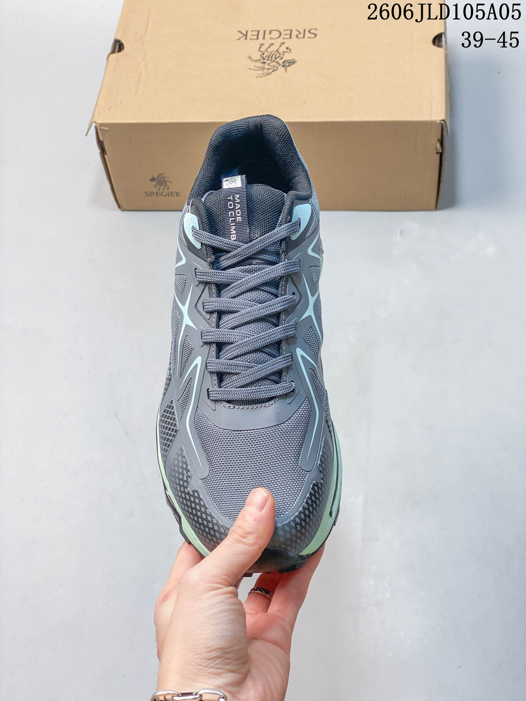 Top view of the lace-up shoe with mesh panels and protective toe detail