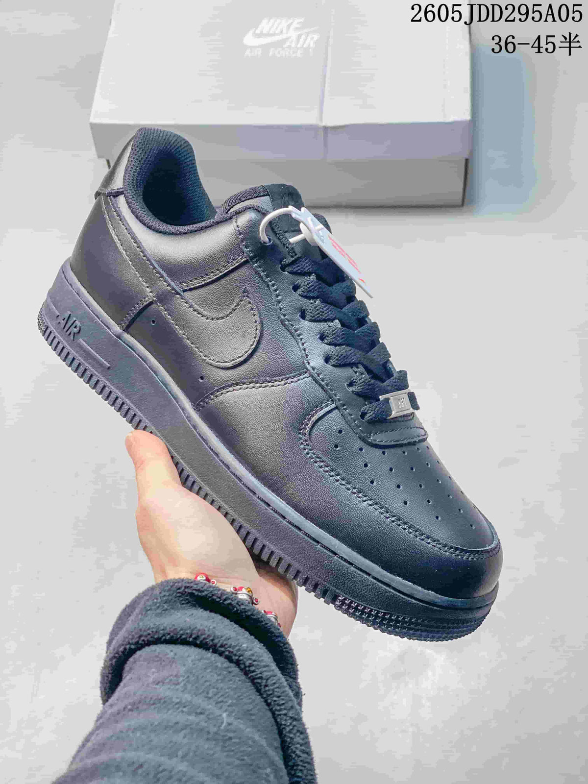 Dark Nike Air Force 1 low-top sneaker with tonal Swoosh and sole