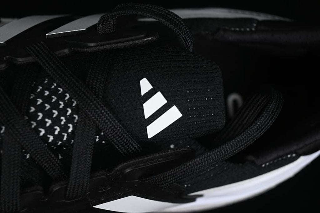 Close-up of the tongue, laces and Adidas logo