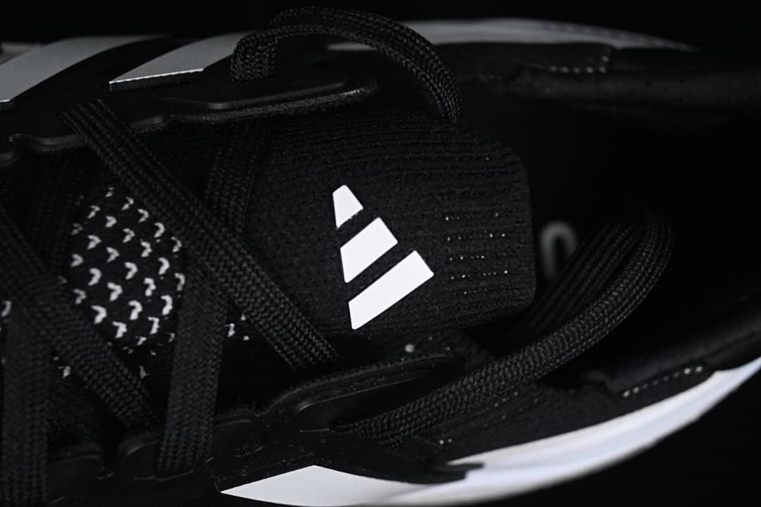 Close-up of the tongue, laces and Adidas logo