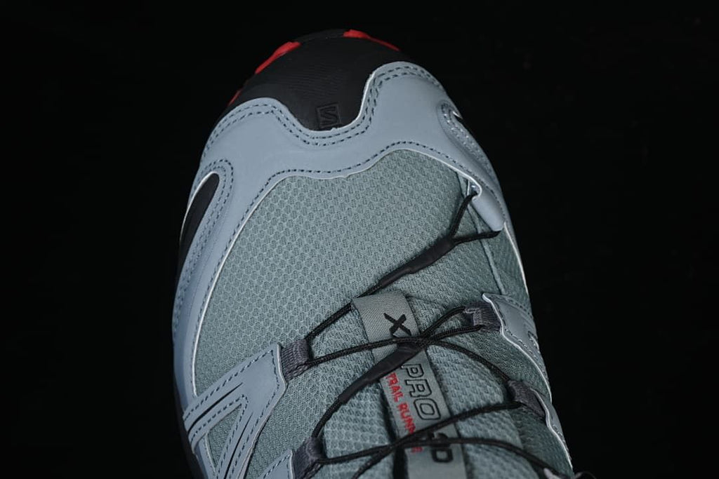 Top view of the trail shoe toe and lacing system
