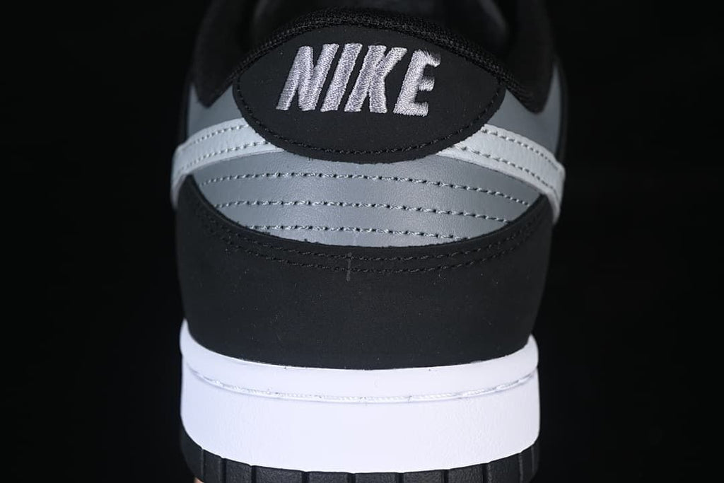 Rear view highlighting the grey heel panel and embroidered branding