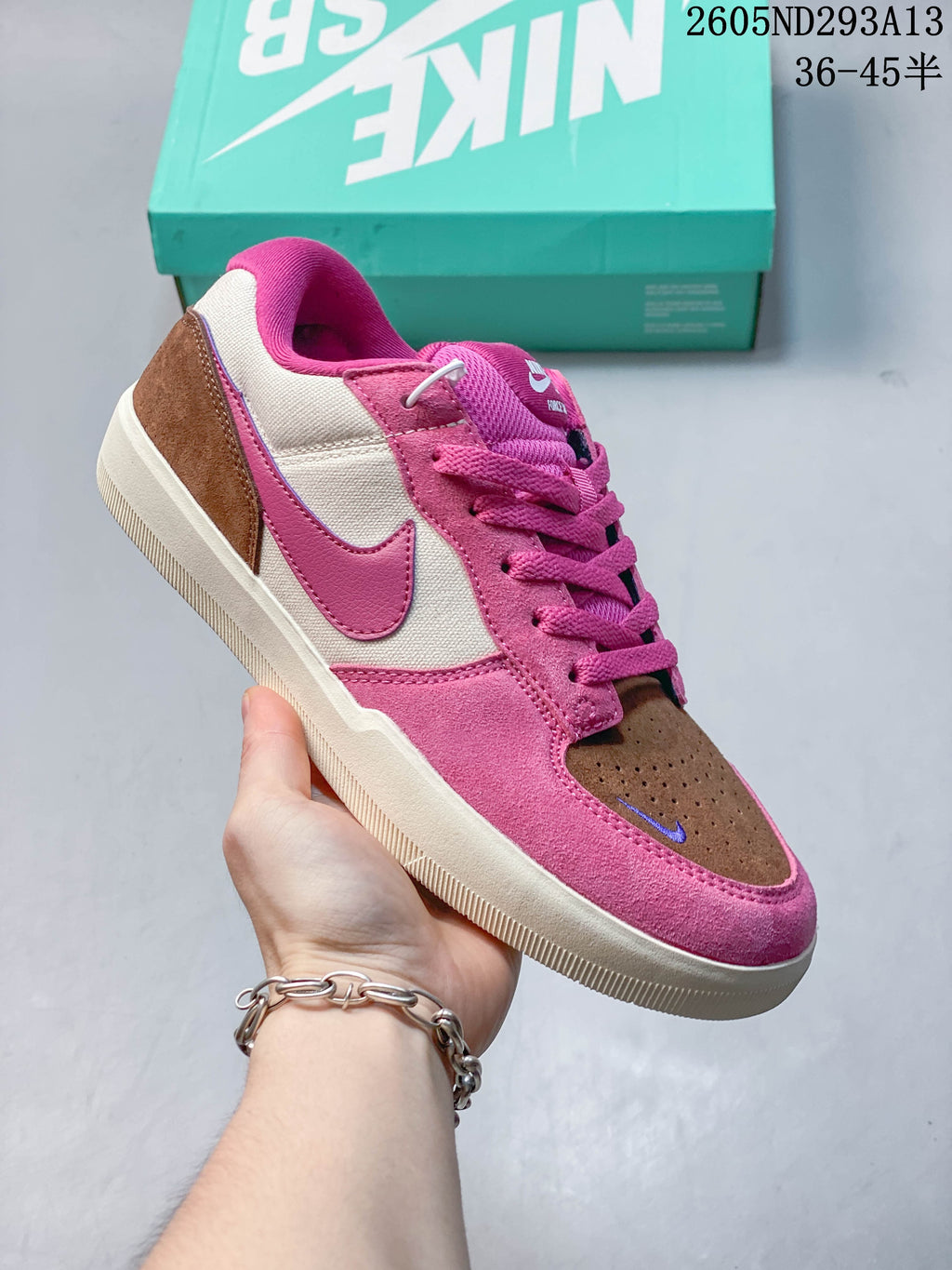 Pink and cream Nike SB Force 58 shoe with brown toe and heel panels
