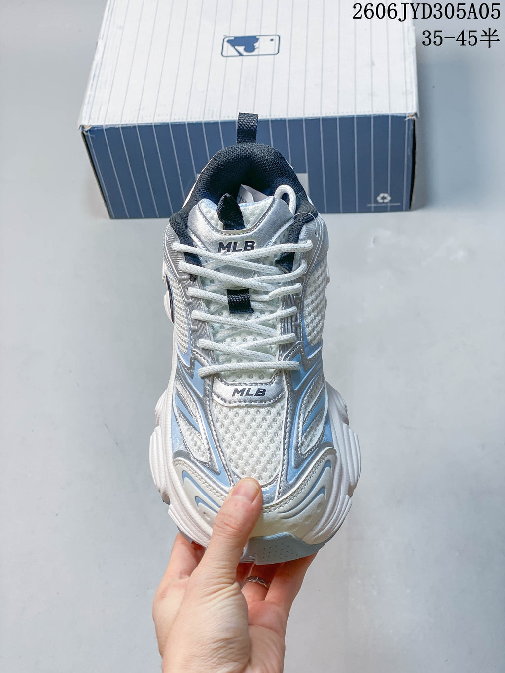 Top view of the laces, tongue, and front of the sneaker.