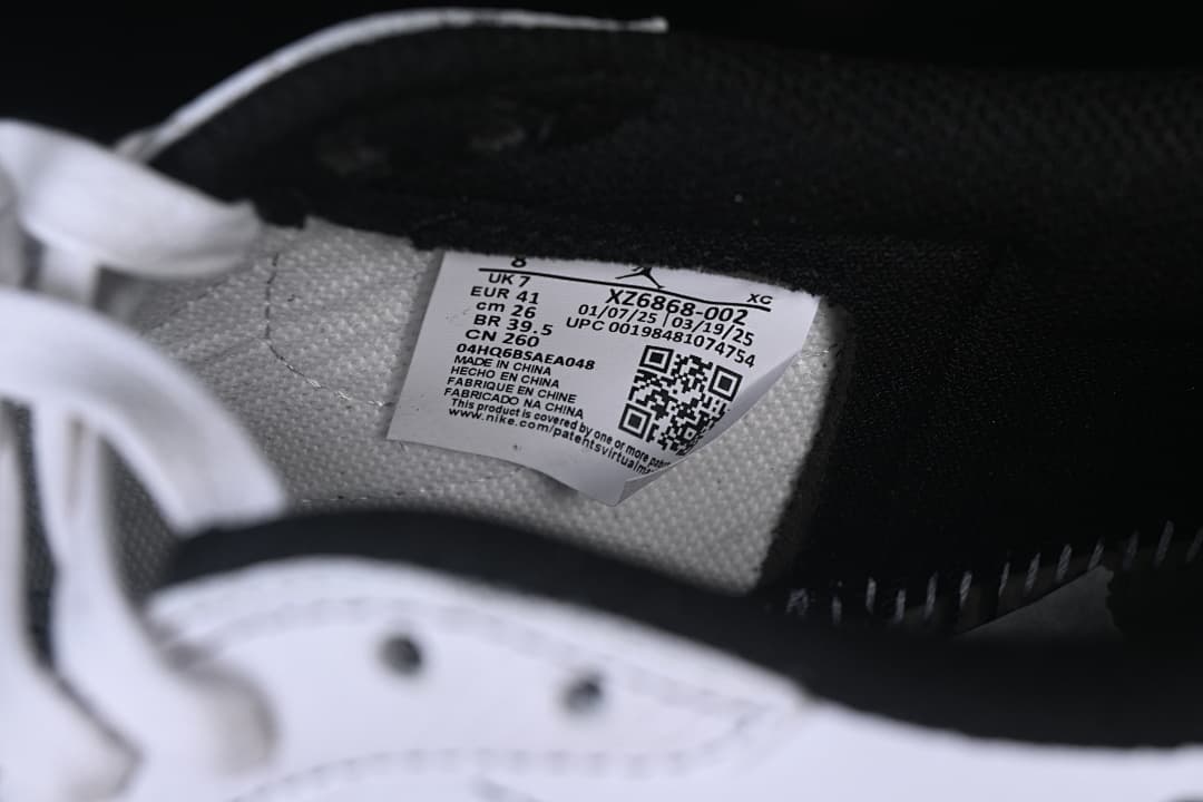 Close-up of the inside size label showing EU 41 and style code XZ6868-002.