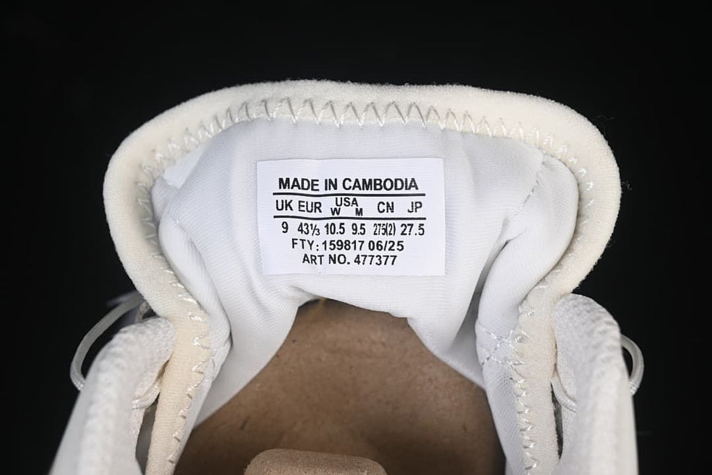 Tongue size label showing UK 9, EUR 43 1/3, US men 10.5, US women 9.5, and JP 27.5.
