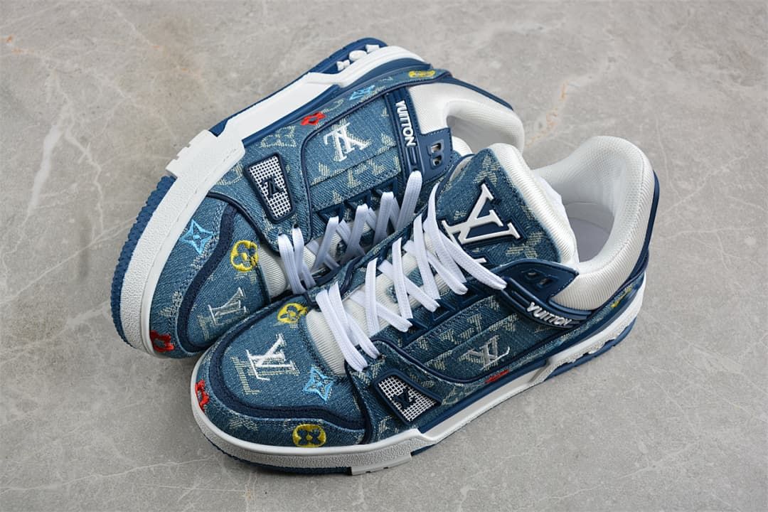 Pair of blue patterned low-top sneakers shown from above at an angle.