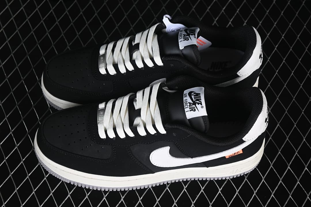 Pair of black and white Nike Air Force 1 '07 Low sneakers