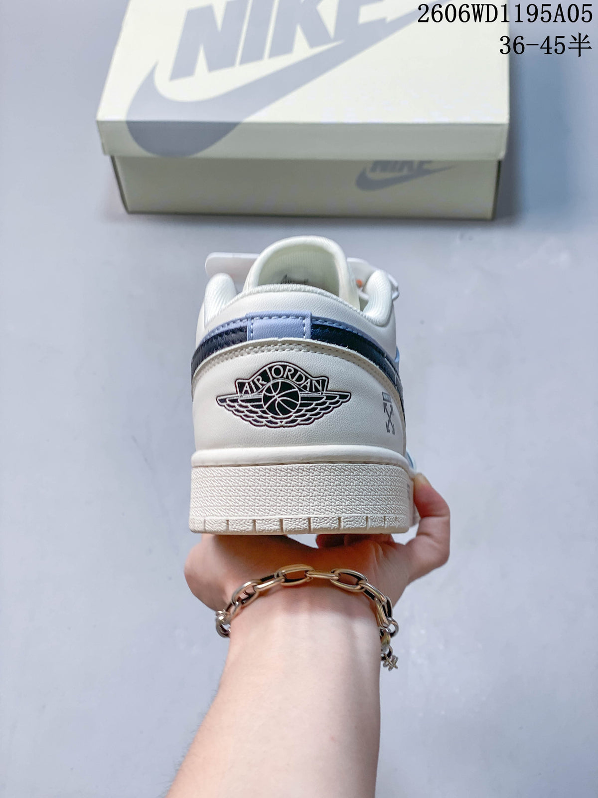Rear view of a white and pale blue low-top sneaker with heel graphics