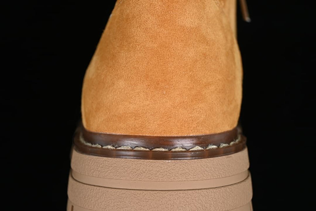 Close-up of the boot's heel and layered outsole