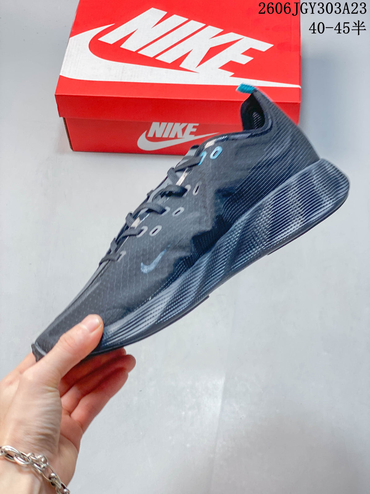 Side view showing the textured upper and raised sole of a Nike Ava Rover shoe
