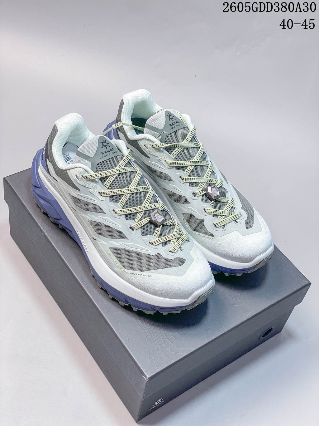 Pair of light blue, gray, white, and violet Kailas C4 trail shoes viewed from above and at an angle.