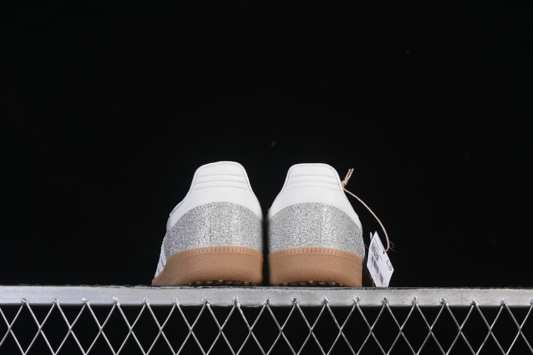 Rear view of the pair showing white heel details and silver glitter-effect panels.