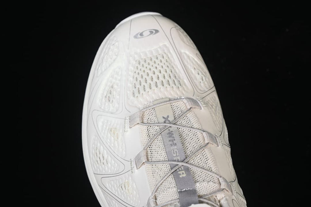 Top view highlighting the toe, mesh panels, and lacing