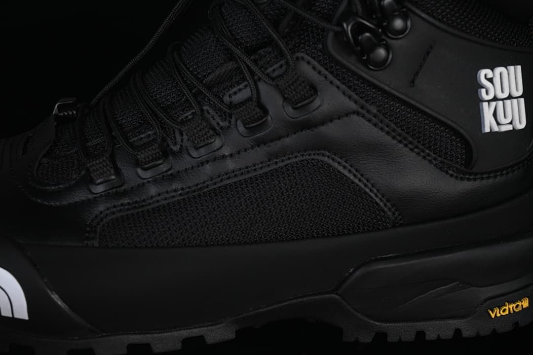 Close-up of side panels, lace hardware and lugged outsole