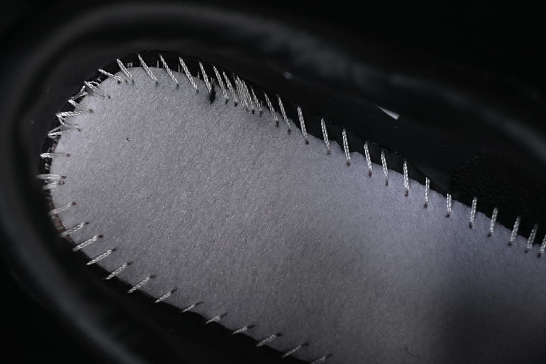 Close-up view inside the sneaker around the footbed edge