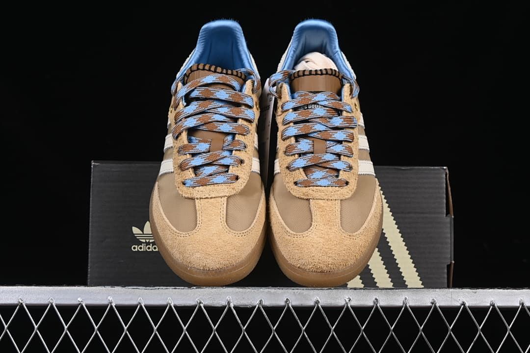 Front view of the pair with patterned laces and textured tan toe overlays