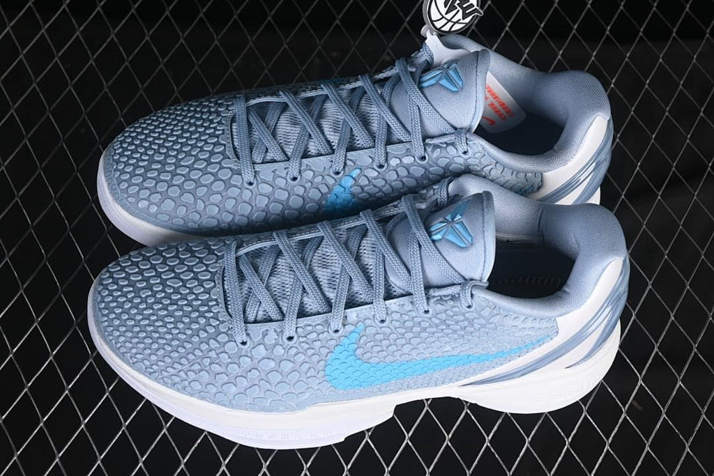 Pair of light blue and white Kobe VI Protro shoes