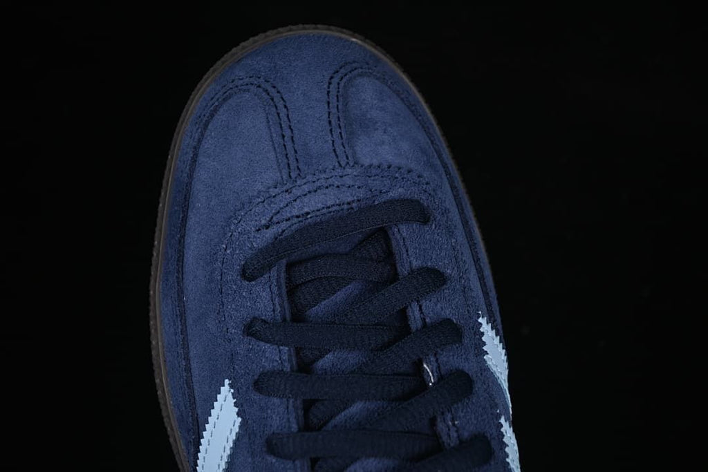 Top-down view of the navy lace-up toe